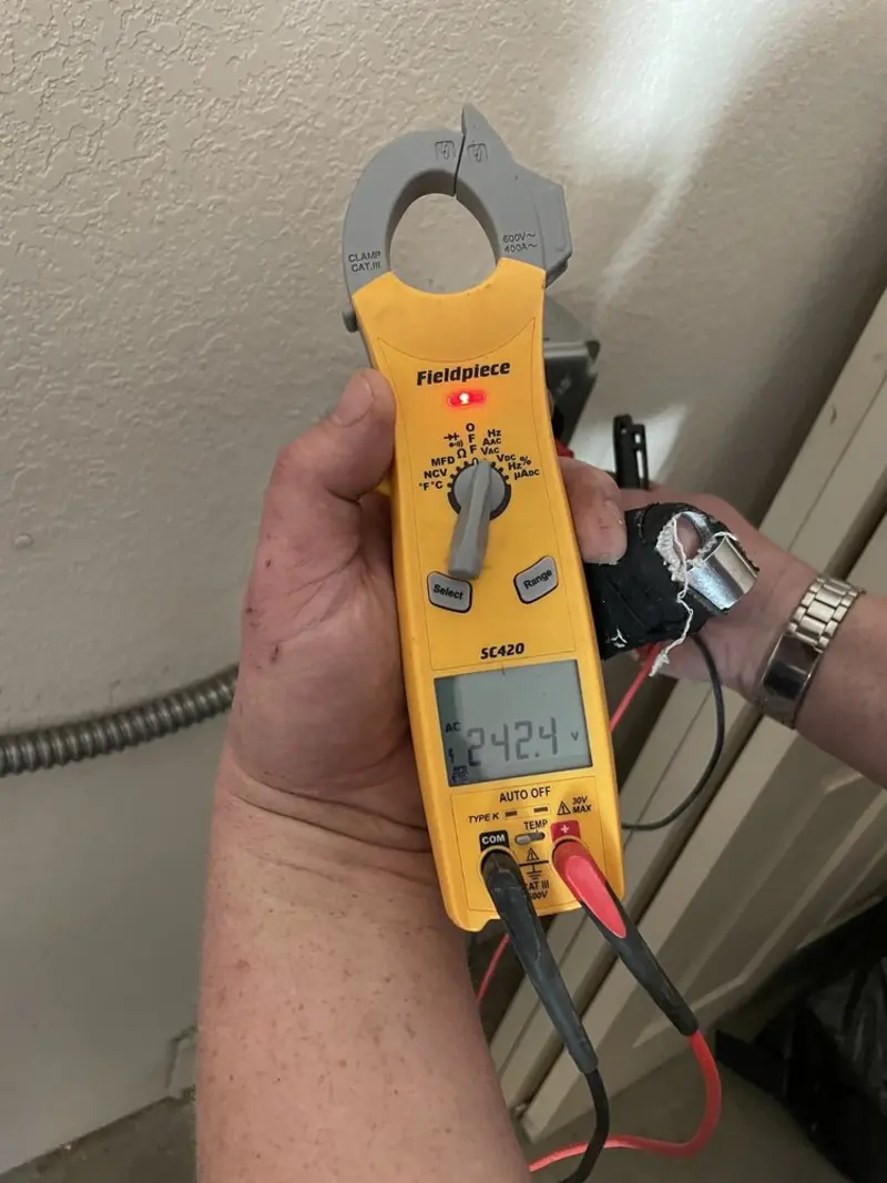 Voltage testing with clamp meter during Recessed Lighting Installation in Dunean